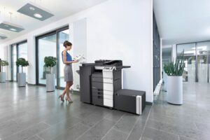 Konica Minolta bizhub 658e, mono multifunctional photocopier, large capacity trays with booklet finisher in office location
