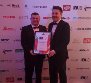 Winner Business Print with their award